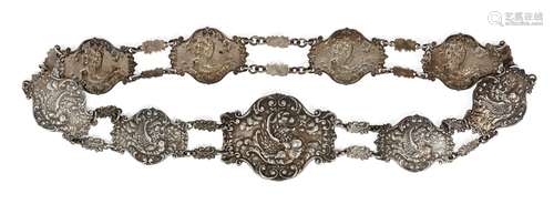 An Edwardian silver link belt, Birmingham, 1906, Levi & Salaman, each panel repousse decorated