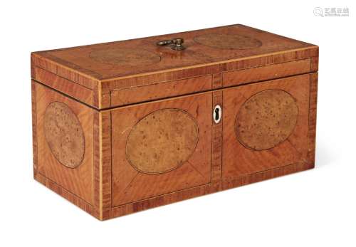 A George III satinwood three-division tea caddy, the inlaid two section top with loop handle, over