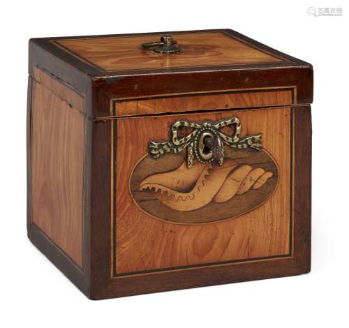 A George III satinwood cube-shape tea caddy, the loop handle and bow lock plate within ebonised
