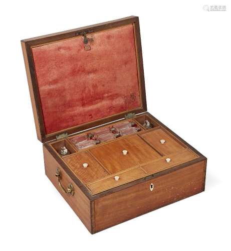 A George III satinwood toilet box, the inlaid top opening to reveal a fitted interior of multiple