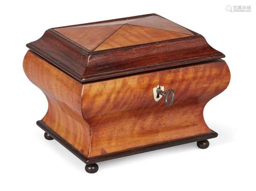 A Regency satinwood sarcophagus bôite à poudre, ogee sides, interior mirror, with single lidded