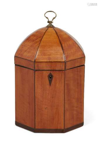 A George III octagonal dome-top satinwood tea caddy, late 18th century, mahogany and ebony strung,