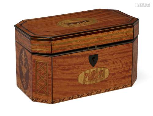 A George III satinwood tea caddy/box, with inlaid ovals decorated with urns, with chamfered corners,