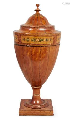 A George III decorated and crossbanded satinwood knife urn, with ebony and boxwood line stringing