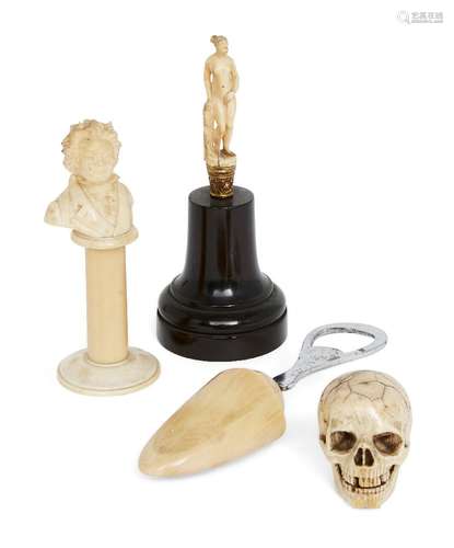 Four miniature carved ivory objects of vertu, 19th century, including a bottle screw top in the form