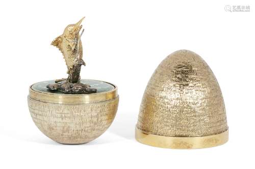 A textured silver gilt surprise egg by Stuart Devlin, London, c.1985, opening to reveal a giant