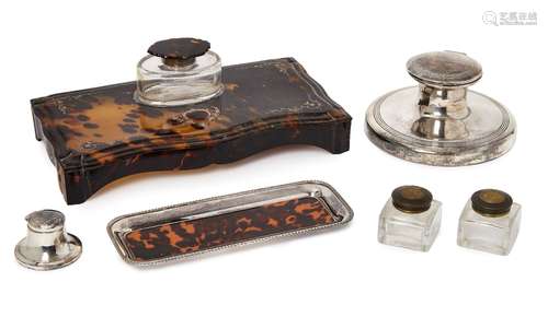 A selection of silver and tortoiseshell inkwells, 19th century and later, to include: an Edwardian