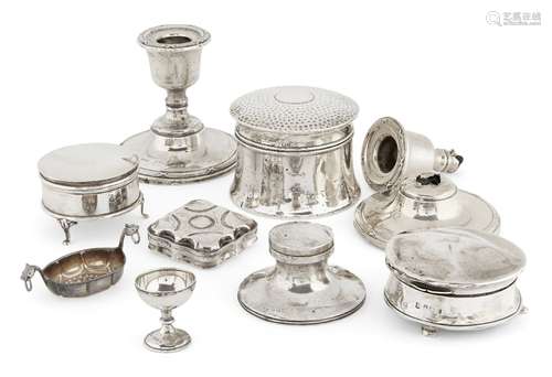 A group of small silver items comprising: a small circular trinket box raised on three trefoil-