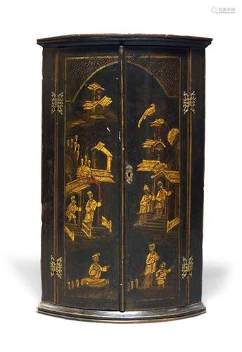 A George III black Japanned and parcel gilt corner cupboard, of bowfront form decorated with figural