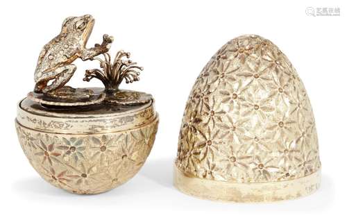 A silver gilt surprise egg by Stuart Devlin, London, c.1978, opening to reveal a sprung frog leaping