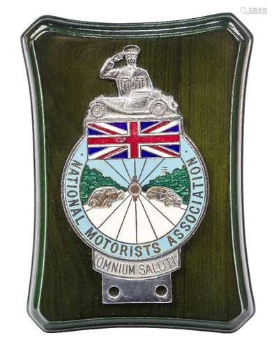 A National Motorists Association enamelled nickle-plated car bumper badge, 1930s, with cast motto