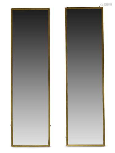 A pair of large giltwood dressing mirrors, early 20th century, of rectangular form, in moulded