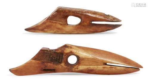 Two carved Inuit whalebone harpoon points, 19th century, (lacking tips), largest 10cm long