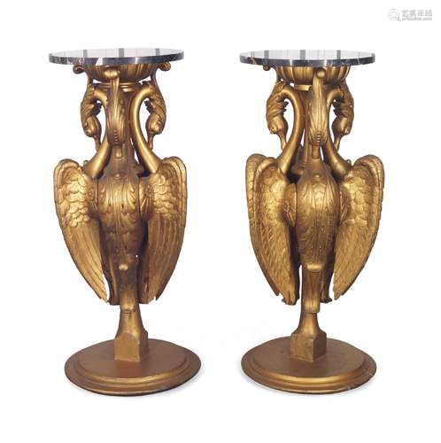 A pair of gilt wood side tables, second half 20th century, with circular black variegated marble