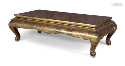 A modern black lacquered and gold coffee table, in the Chinese taste, late 20th century, the