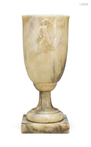 An alabaster urn, late 19th century, of tapered form with carved classical figure, raised on socle