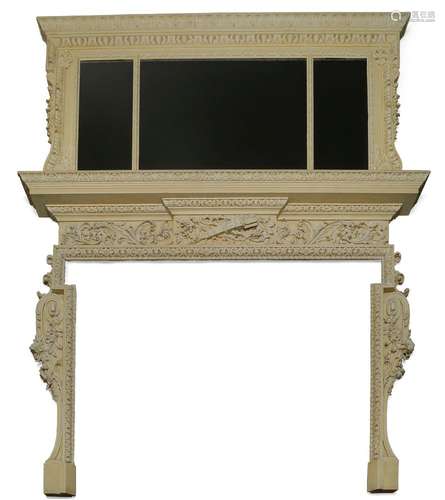 A Louis XVI style cream painted and carved fireplace, early 20th century, the frieze with c scroll