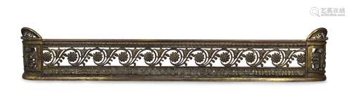 A brass fire surround, late 19th century, with pierced foliate frieze and stiff leaf decoration,