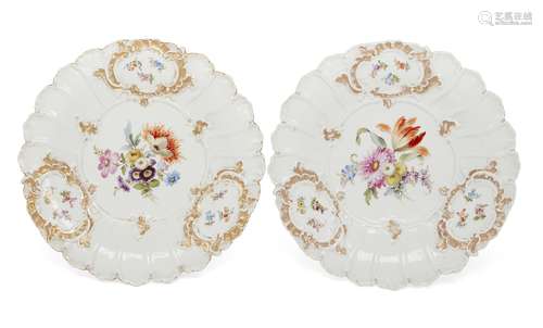 A pair of Meissen cabinet plates, 19th Century, each decorated with Deutsche Blumen to the centre