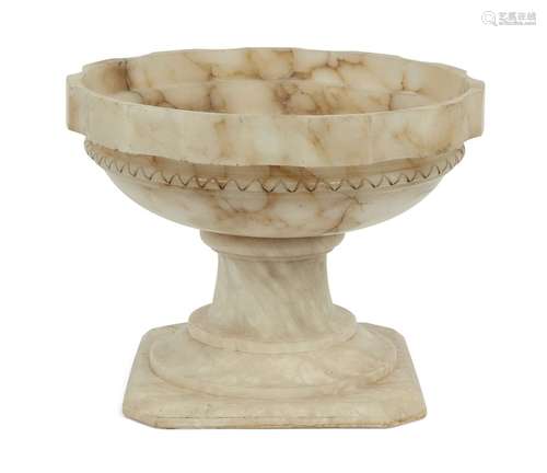 A large alabaster tazza, late 19th century, with shaped circular bowl raised on socle stand to