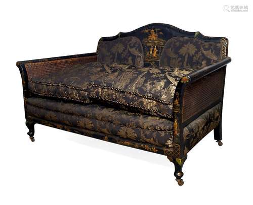 A black Japanned, parcel gilt and caned suite, early 20th century, comprising a two seat sofa,