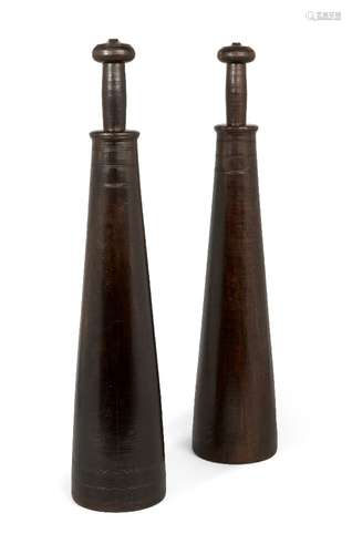 A pair of treen exercise weights, 19th century, each of tapering conical form with reeded ornament