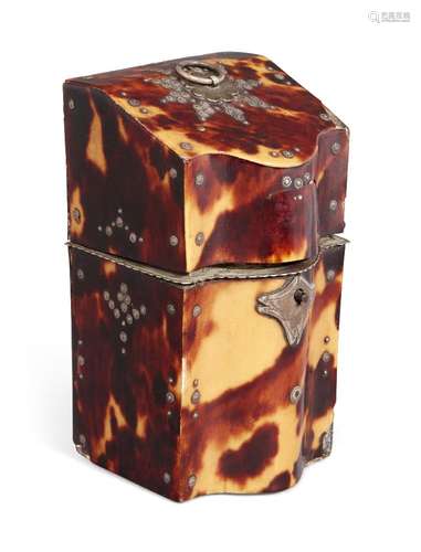 A George III tortoiseshell necessaire, of tapering knife box form with bow front and stud details,