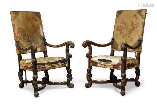 A pair of William and Mary style high back armchairs, first half 20th century, with rectangular