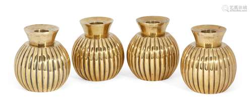 A set of four Egyptian 800 silver gilt candlestick holders, c.1943, of globular vase form, with