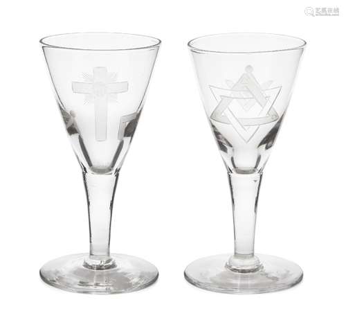 A pair of Masonic port glasses, 19th century, possibly continental, with bell form bowls, engraved