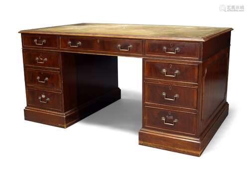 A mahogany pedestal desk, early 20th century, the rectangular top inset with green leather writing