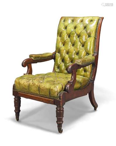 A William IV mahogany reclining armchair by Roberts Daws, with green button back leather upholstery,