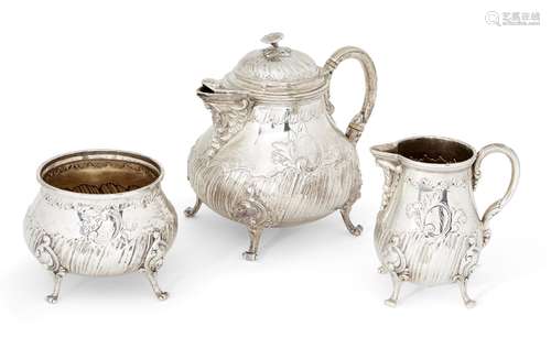 A German 800 silver three piece tea set, unknown maker, comprising a round bellied teapot, milk