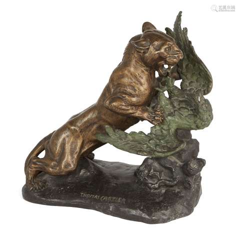 Thomas Francois Cartier, French, 1879-1943, a parcel gilt spelter model of a lioness attacking an