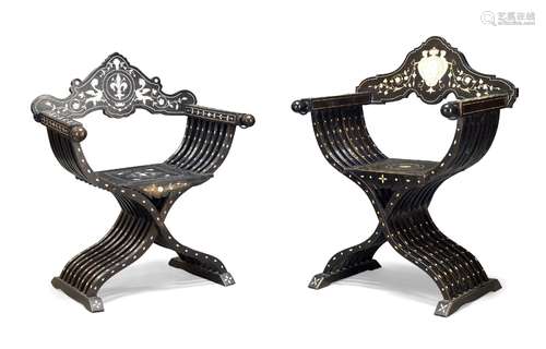 A late Victorian ebonised and ivory inlaid Savonarola armchair, the shaped backrest inlaid with