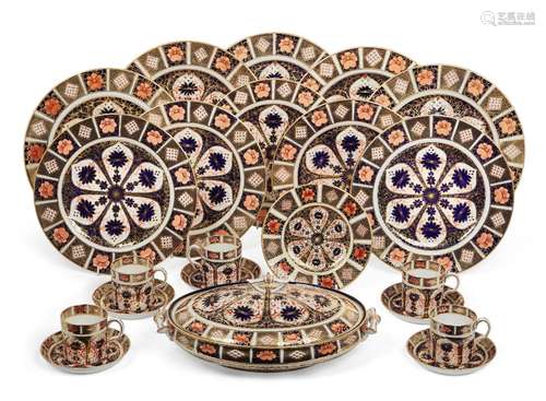 A Royal Crown Derby part dinner service, 20th Century, decorated in the Imari pattern no. 1128,