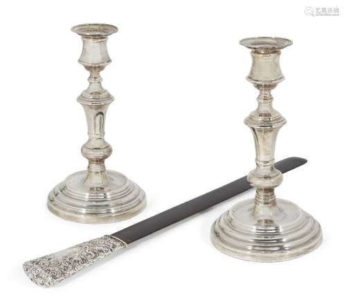 A pair of silver candlesticks, London, c.2004, SG Ltd., the stepped circular bases to knopped