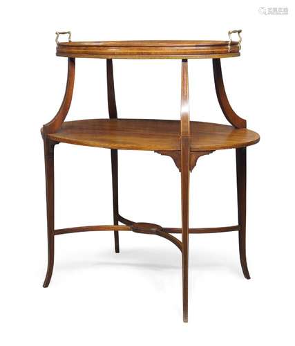 An Edwardian mahogany and inlaid two tier side table, the removeable oval tray top, on square cut