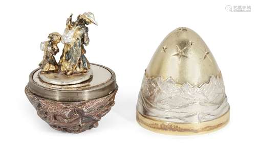 A silver gilt surprise egg by Stuart Devlin, London, c.1987, opening to reveal a mother and child