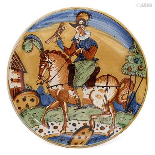 A continental faience charger, late 19th/early 20th century, of circular form, decorated in