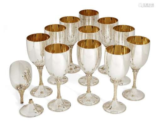 A set of 12 Garrard & Co. Britannia silver wine goblets, London, c.1977, (one damaged) each designed