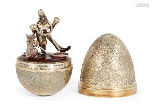 A silver gilt surprise egg by Stuart Devlin, London, c.1980, opening to reveal a red-nosed circus