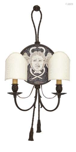 A painted brass twin branch wall light, 20th Century, the circular inlaid design set with central