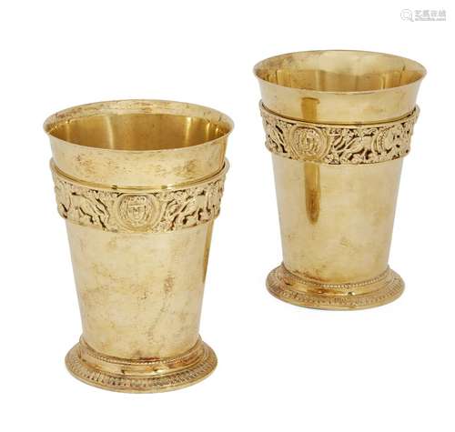 A pair of Victorian silver gilt beakers, London, c.1881, Stephen Smith, of gently tapering