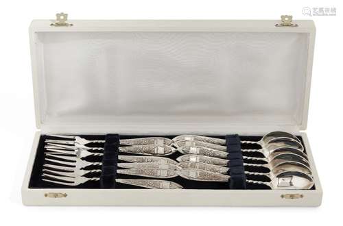 A cased set of Greek silver cake eaters, comprising six each cake spoons and forks, each designed