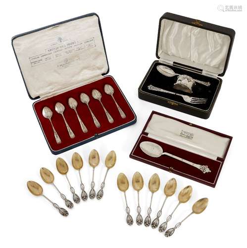 A boxed Christening set comprising a spoon, fork and napkin ring, Birmingham, c.1948, Adie Brothers,