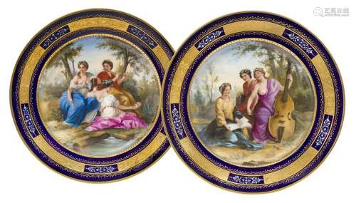 A pair of Vienna porcelain cabinet plates, early 20th century, Ackermann & Fritze, each with figural