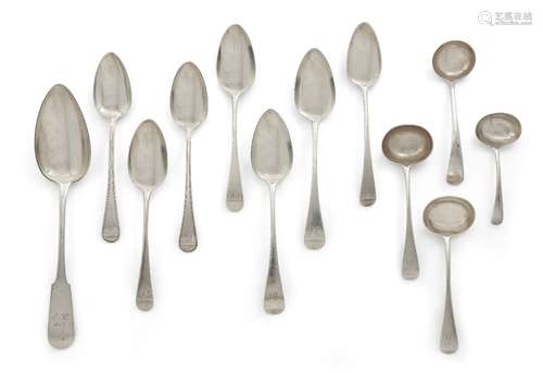 A quantity of silver spoons comprising: a large German silver spoon with 12 loth mark and stamp