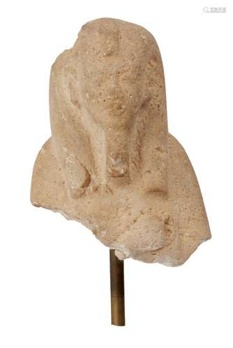 A yellow quartzite upper section of a shabti of Akhenaten clutching an ankh hieroglyph in the