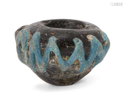 A rod-formed purple glass bulbous jar, Eastern Empire, 4th-5th century, with opaque turquoise thread